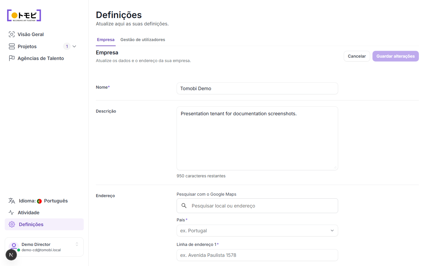 A página Configurações mostrando a aba Empresa com o nome "Tomobi Demo" e um campo de descrição, e a aba Gestão de usuários visível ao lado